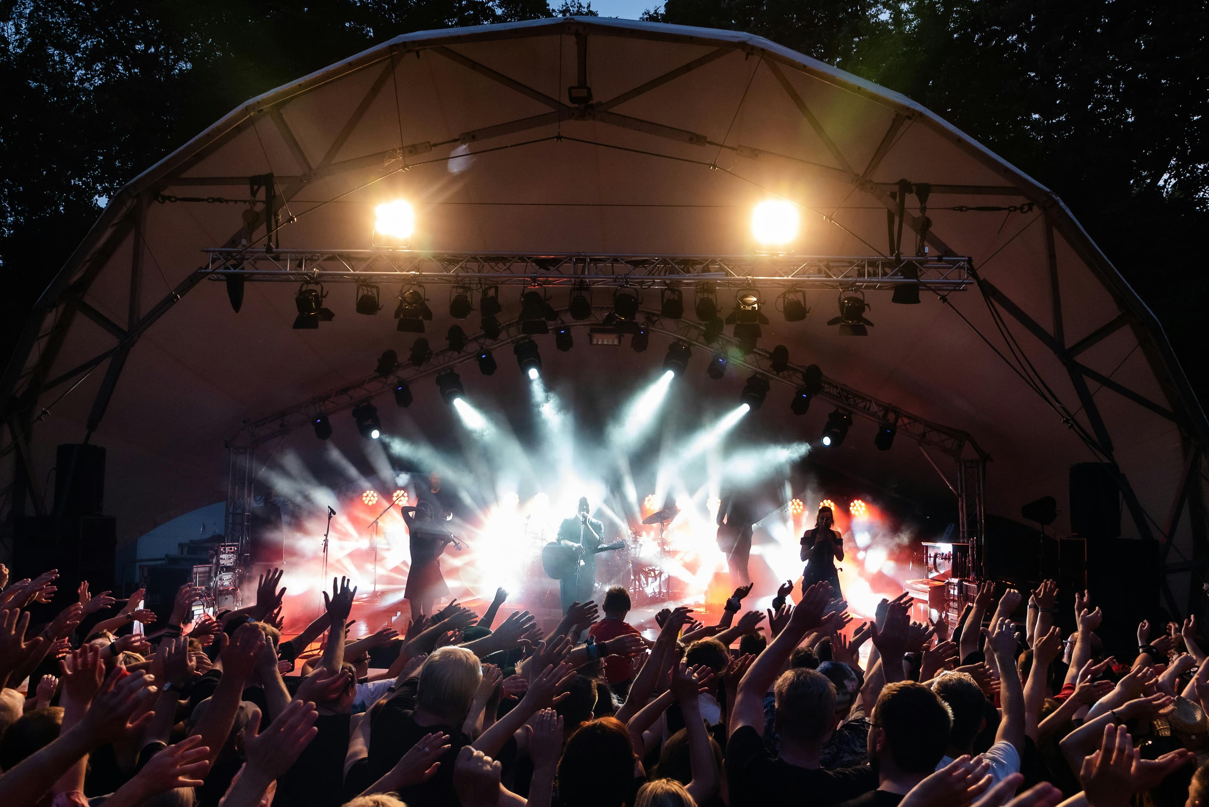 An energetic event atmosphere with music and celebration